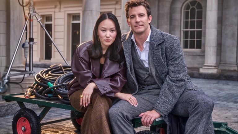 Yerin Ha and Luke Thompson in modern clothing on the set of Bridgerton season 4
