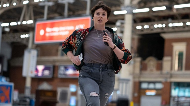 Alexandra Roach as Abby running through Victoria Station in BBC One's Nightsleeper