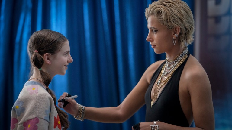 Skye Riley (Naomi Scott) signs a fans shirt in Paramount Pictures Presents A Temple Hill Production A Parker Finn FIlm "SMILE 2"